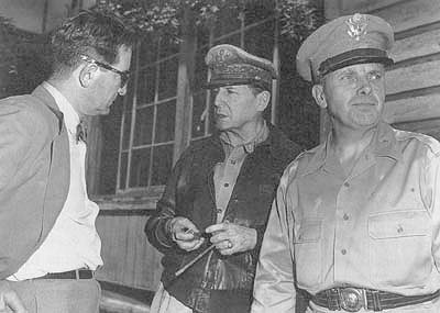 General MacArthur discusses the military situation with Ambassador John J. Muccio at ROK Army headquarters, 29 June 1950.